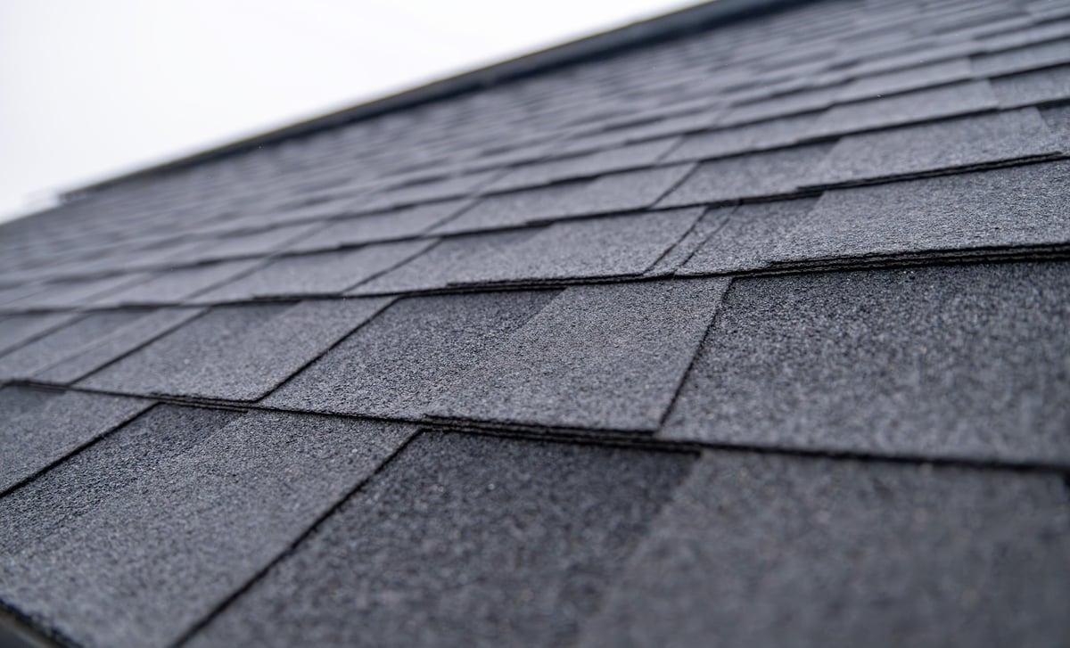 Dark gray asphalt roof shingle texture
