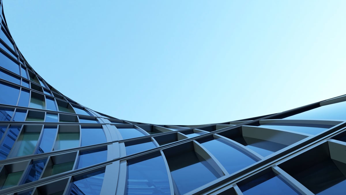 Modern commercial building exterior under a clear sky